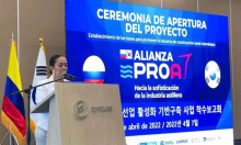 Foto de la Directora Viviana hablando ante el auditorio del evento